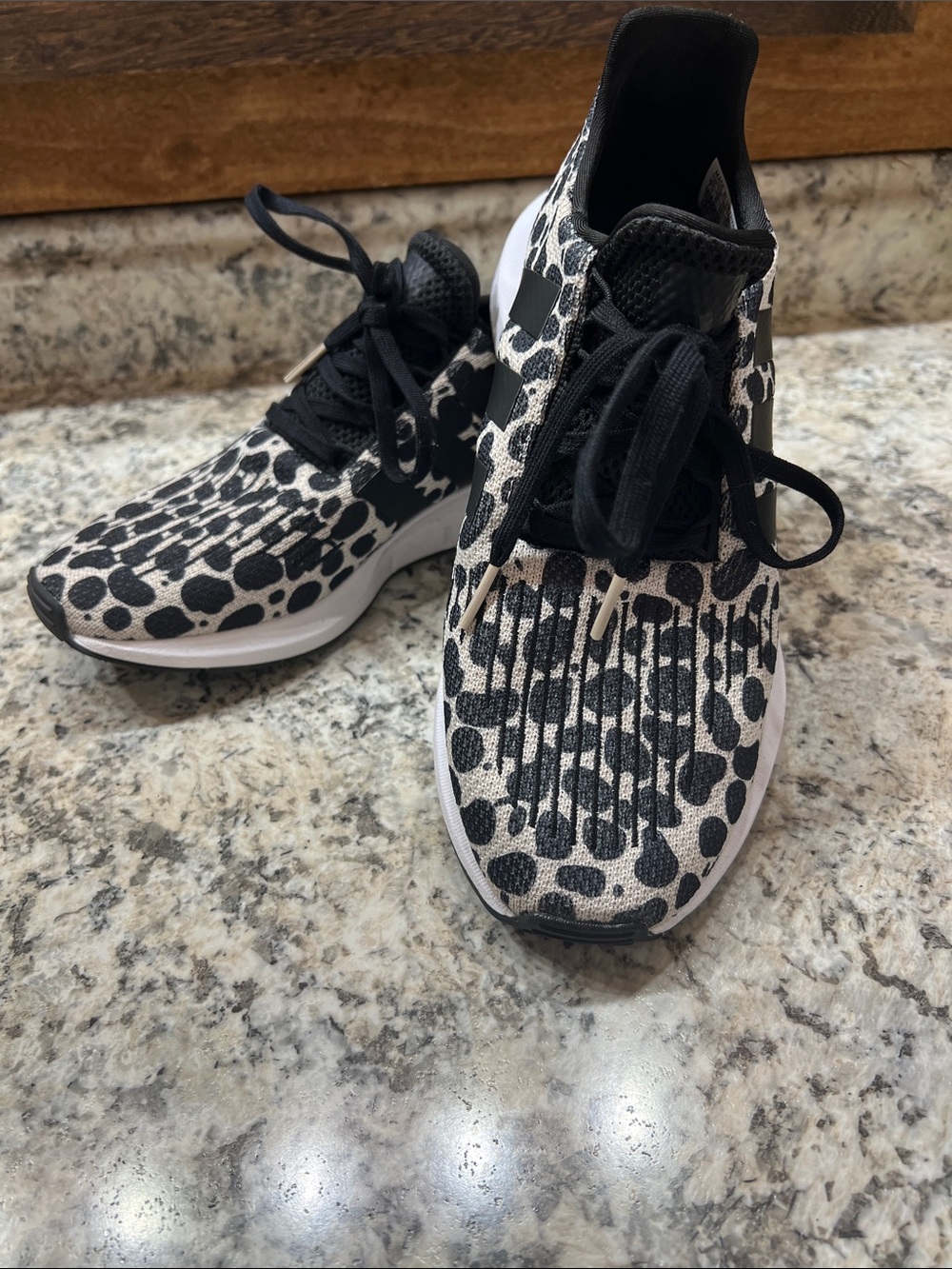 Womens Black & White Leopard Print Athletic Sneakers.